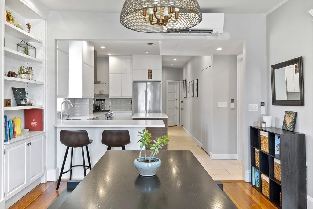 23 Strathmore Road, Unit 3 Brookline, MA 02445 - Photo 12 of 26 a view of living room and kitchen