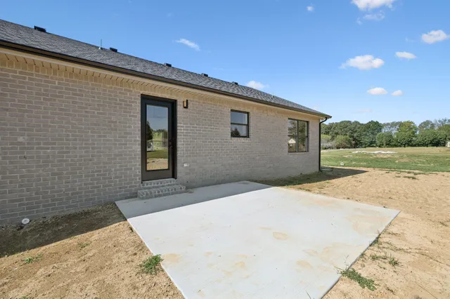 a house view with a backyard space