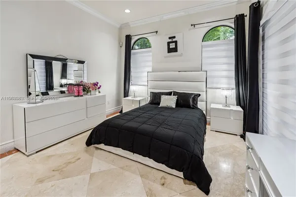 a view of a bathroom with a shower and a sink