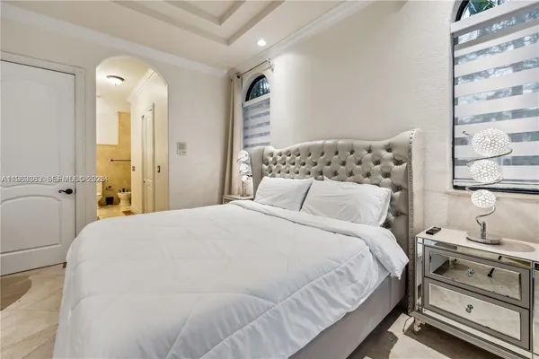 a front view of a house with glass windows