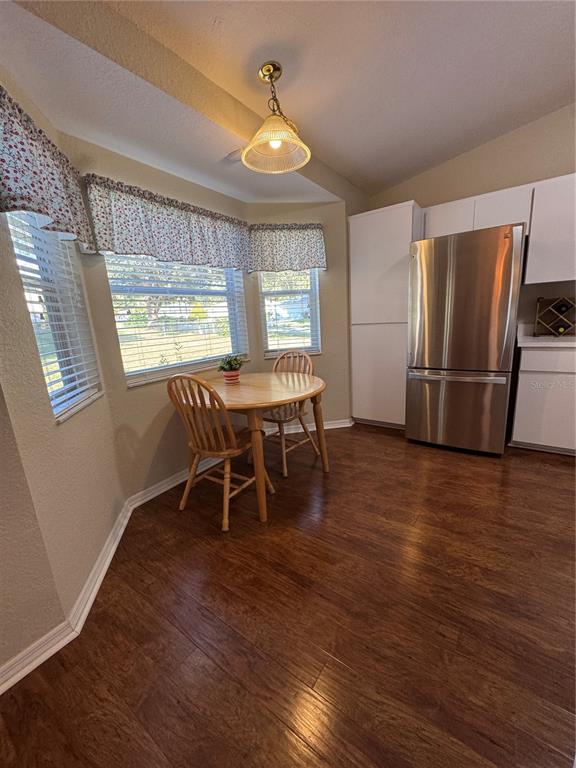6071 Southwest 105th Place Ocala, FL 34476 - Photo 3 of 13 a dining room with furniture and window