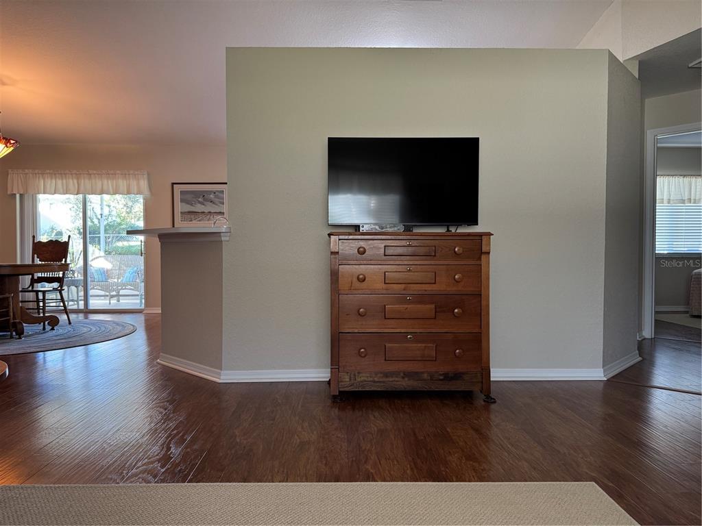 6071 Southwest 105th Place Ocala, FL 34476 - Photo 9 of 13 a living room with furniture and a flat screen tv