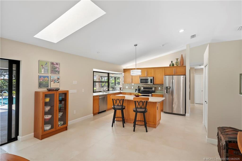 4620 Southeast Quail Trail Stuart, FL 34997 - Photo 14 of 71 a view of a dining room with furniture and window