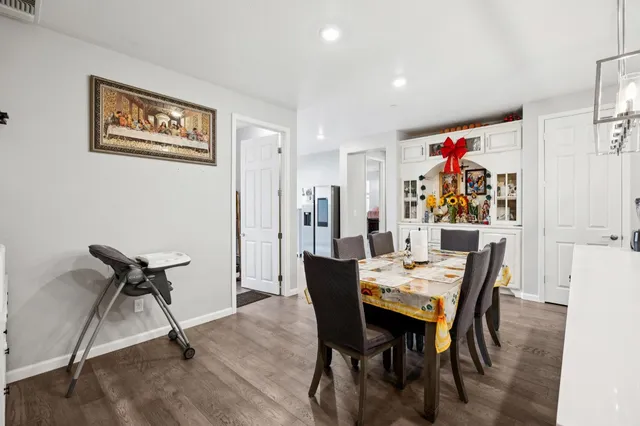 a view of a dining room with furniture