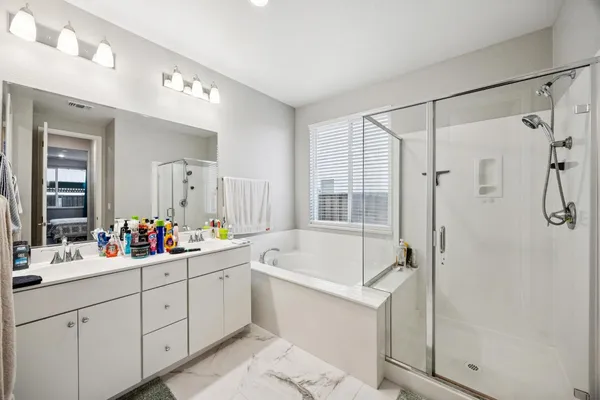 a bed room with a bed and a dresser