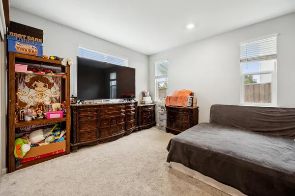 a bathroom with a sink vanity and mirror