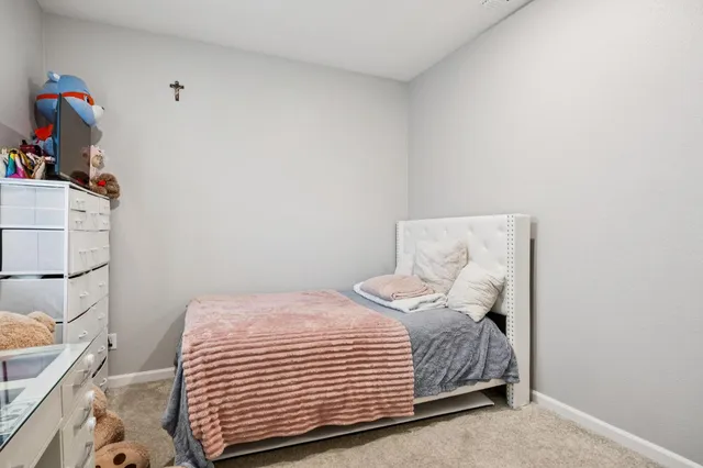 a bathroom with a sink mirror toilet and bathtub