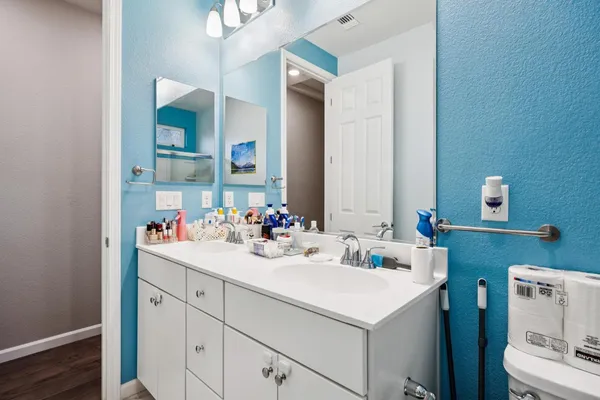 a bedroom with a bed and a cabinets