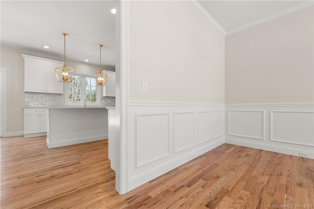 116 Holcomb Hill Road New Hartford, CT 06057 - Photo 12 of 30 Dining Rooms have applique moldings and crown molding as the standard