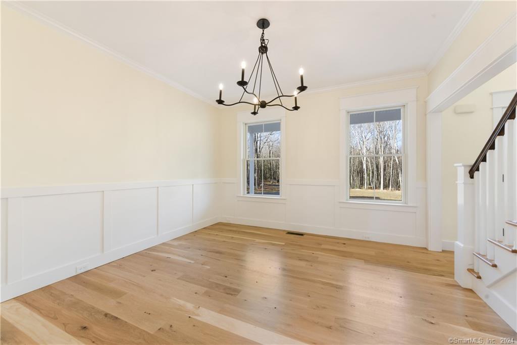 116 Holcomb Hill Road New Hartford, CT 06057 - Photo 14 of 30 Lovely shaker style trim package and character grade white oak flooring are options and are depicted in this custom built home...a sunlit formal dining room