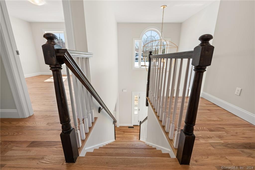 116 Holcomb Hill Road New Hartford, CT 06057 - Photo 17 of 30 Standard staircase to the second floor. Upstairs bedrooms can be customized with hardwood floors. Carpet standard in BRS