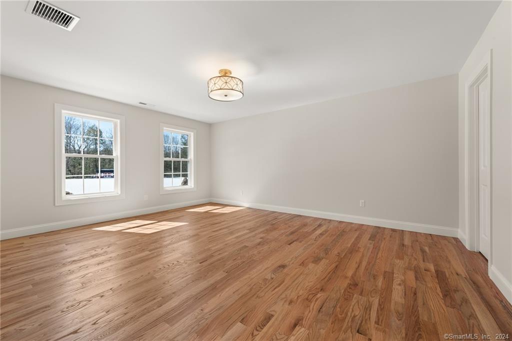 116 Holcomb Hill Road New Hartford, CT 06057 - Photo 19 of 30 Expansive Primary Bedroom Suite
