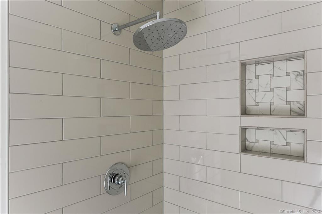 116 Holcomb Hill Road New Hartford, CT 06057 - Photo 22 of 30 Beautiful primary bath has tile shower, all fixtures are custom selected