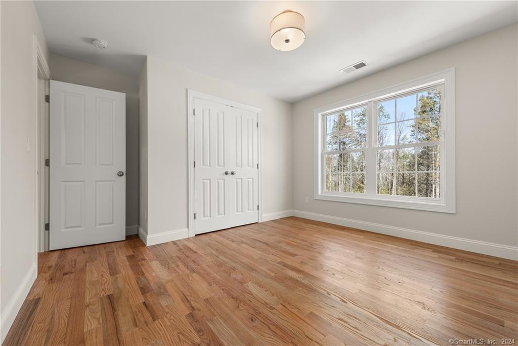 116 Holcomb Hill Road New Hartford, CT 06057 - Photo 23 of 30 Upstairs bedroom: wall to wall carpet is the standard but many folks select beautiful hardwood floor for the bedrooms