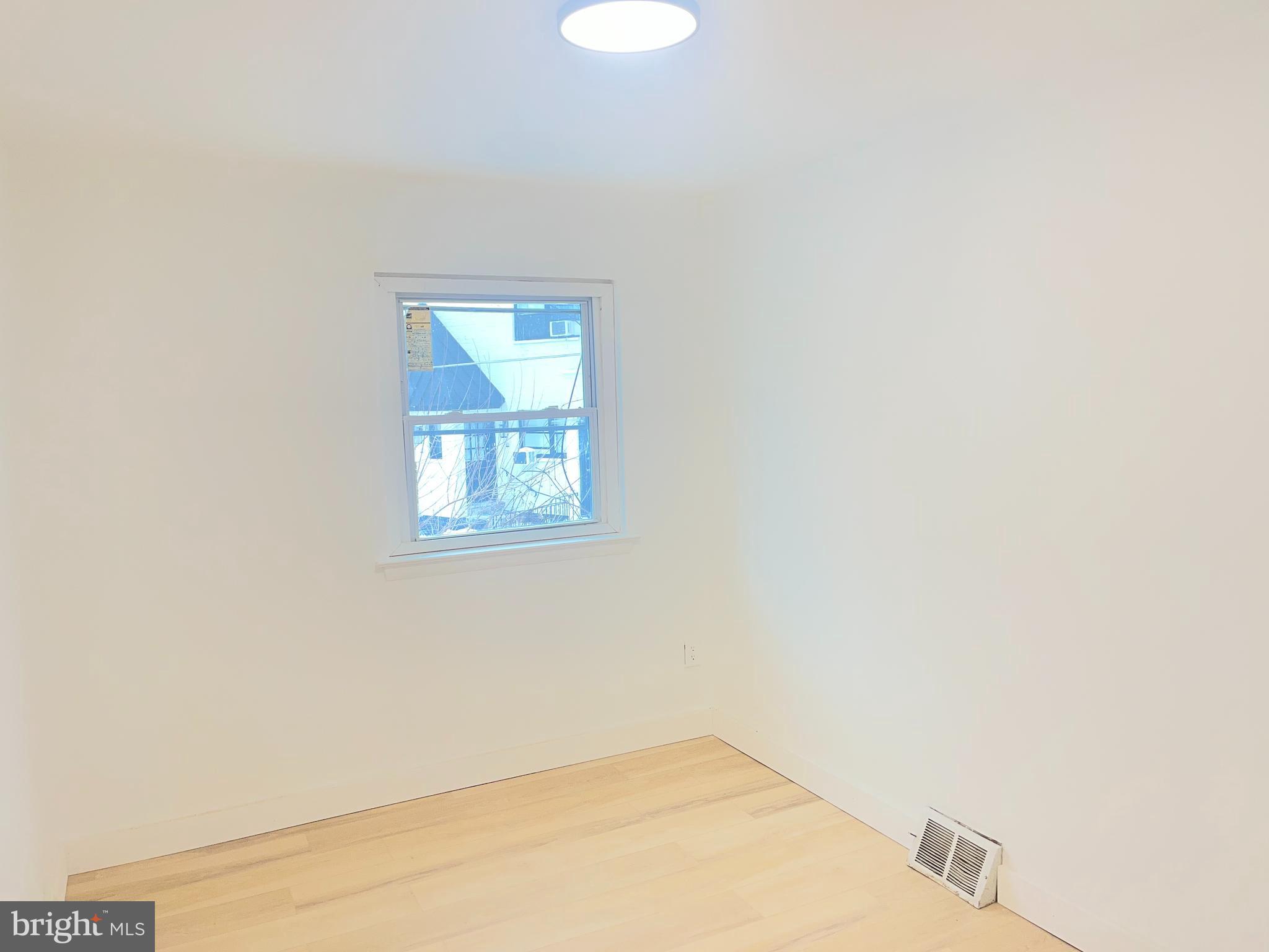 2637 Tremont Street Philadelphia, PA 19152 - Photo 13 of 15 a view of an empty room with a window