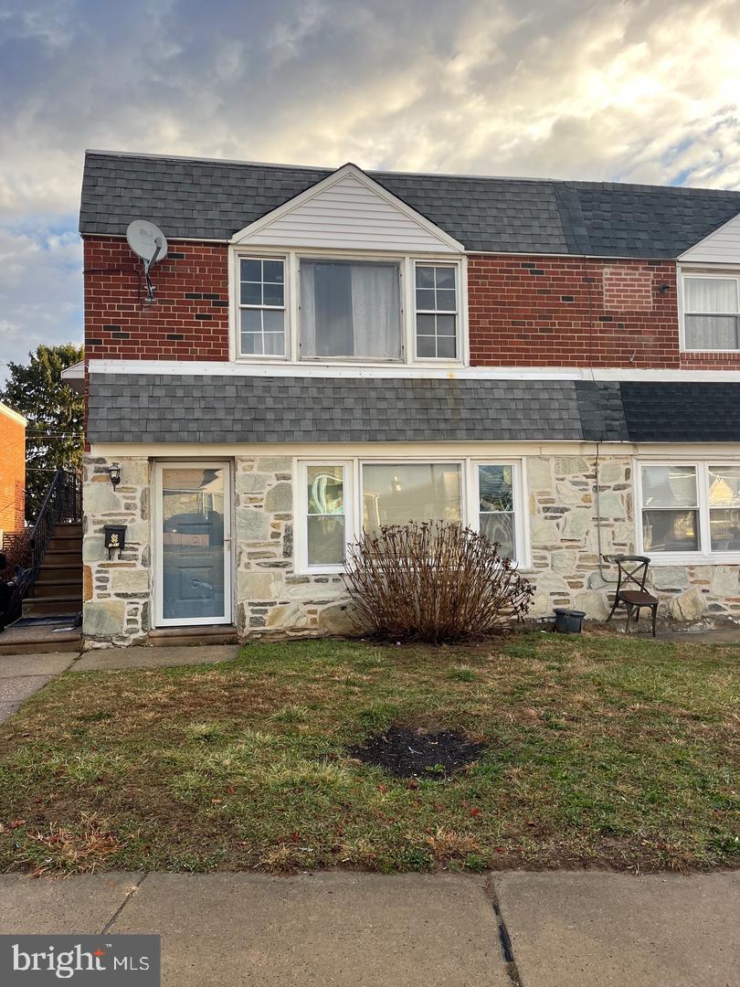 2637 Tremont Street Philadelphia, PA 19152 - Photo 2 of 15 a front view of a house with a garden