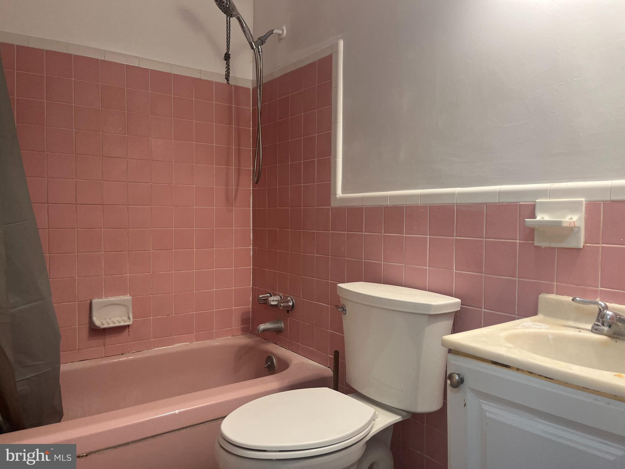 2637 Tremont Street Philadelphia, PA 19152 - Photo 6 of 15 a bathroom with a sink a toilet and bathtub