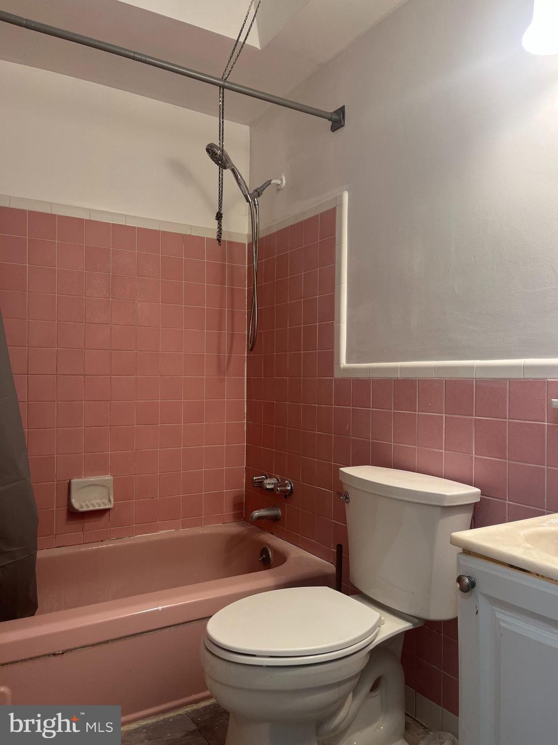 2637 Tremont Street Philadelphia, PA 19152 - Photo 7 of 15 a bathroom with a toilet a sink and shower