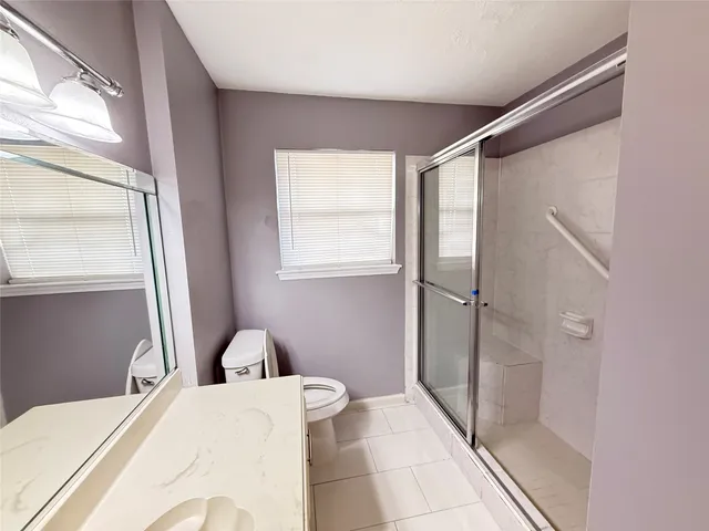 a bathroom with a bathtub and shower
