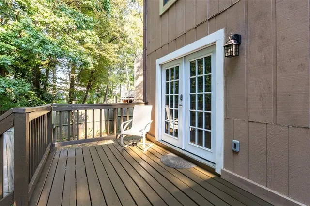 a view of balcony with wooden floor