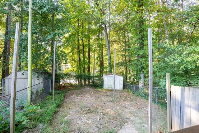 a view of a backyard with garden