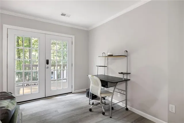 a workspace with furniture and a window