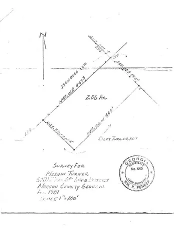 a picture of a room with a white wall and a rack