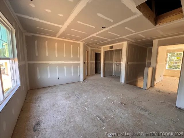 an empty room with windows