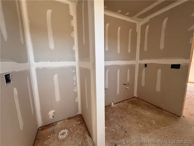 a bathroom with a tub and a shower