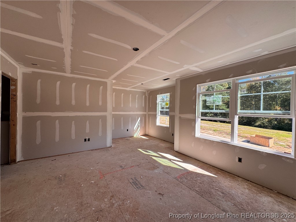 271 Elijah Way Vass, NC 28394 - Photo 16 of 28 a view of an empty room with a window