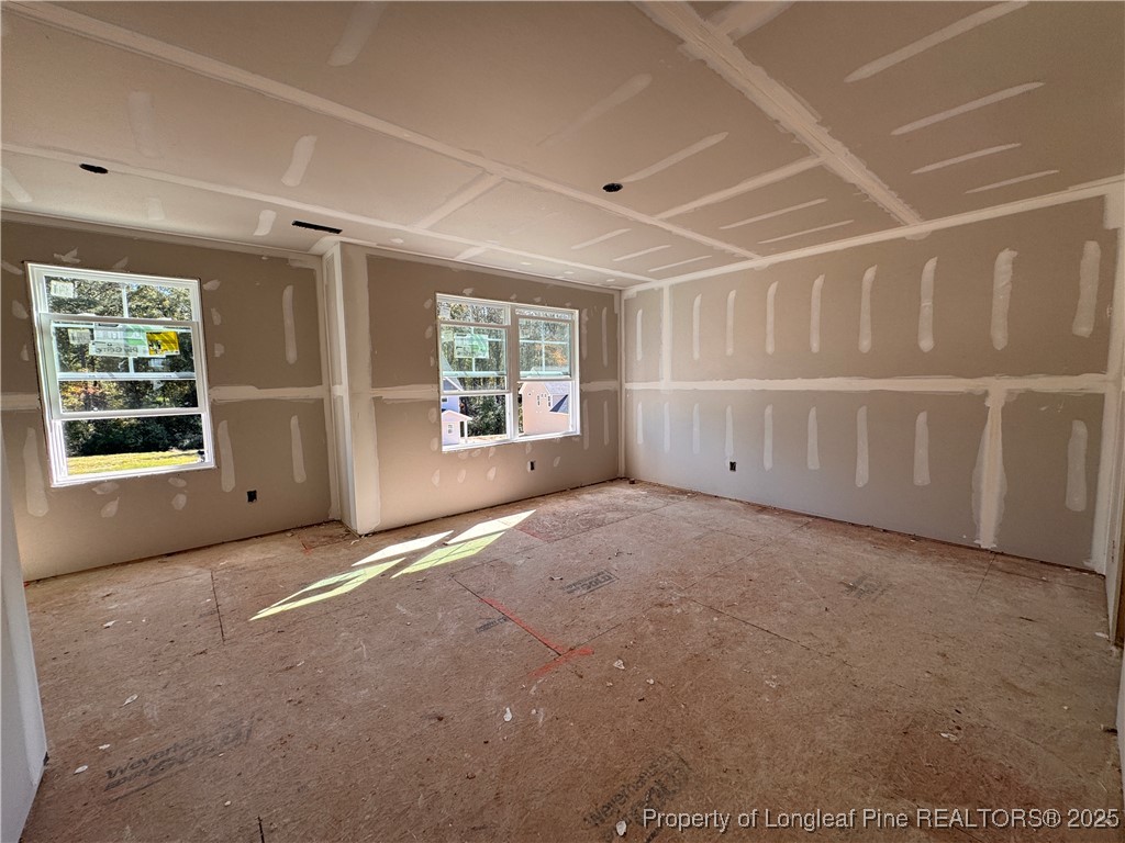 271 Elijah Way Vass, NC 28394 - Photo 17 of 28 a view of an empty room with a window