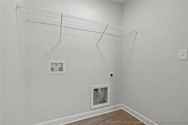 a bathroom with a tub and shower