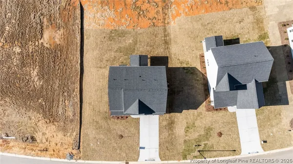 a kitchen with stainless steel appliances granite countertop a sink a stove and cabinets