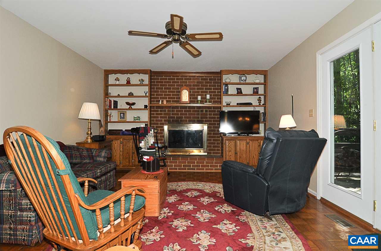 2424 Thrush Road Charlottesville, VA 22901 - Photo 11 of 25 a living room with furniture a rug and a window