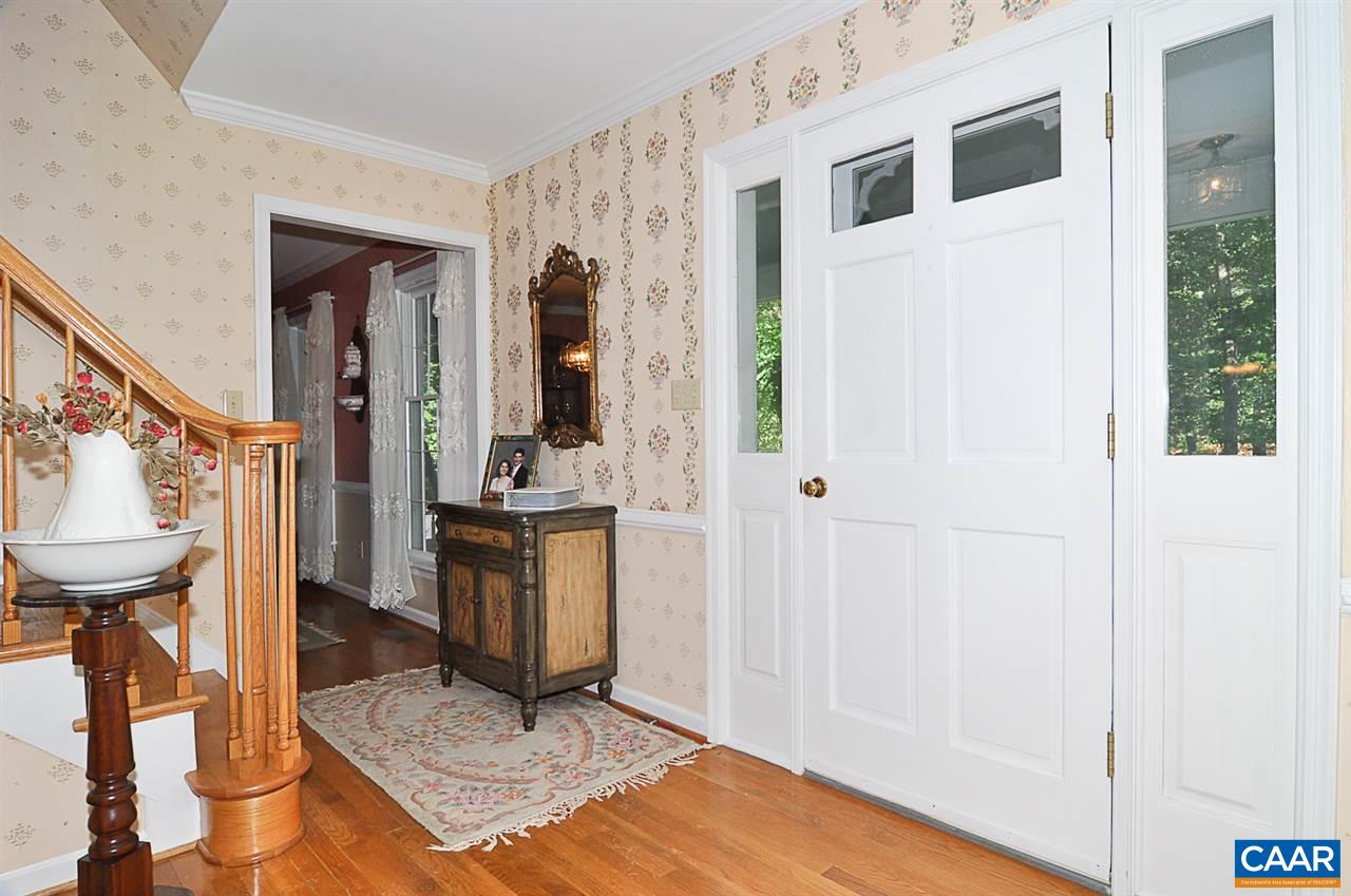 2424 Thrush Road Charlottesville, VA 22901 - Photo 12 of 25 a view of an entryway and livingroom with furniture