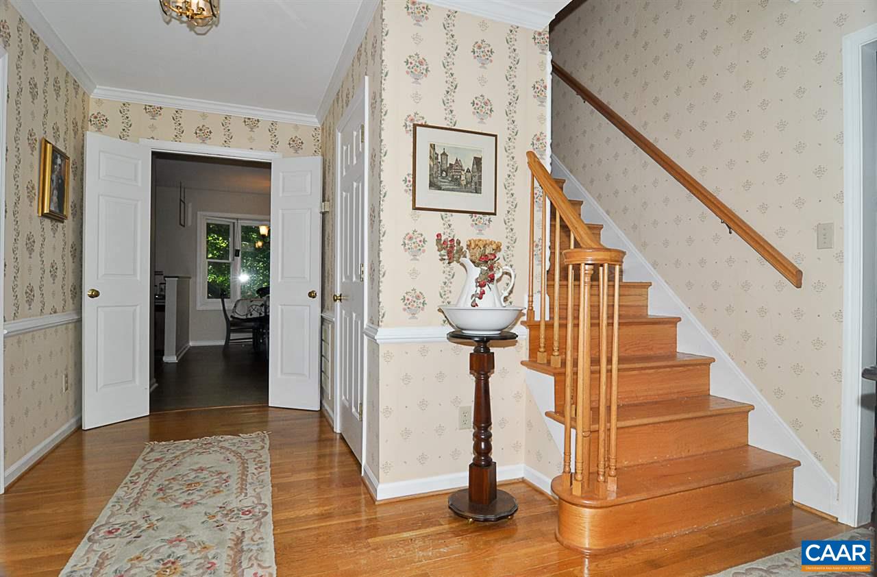 2424 Thrush Road Charlottesville, VA 22901 - Photo 13 of 25 a view of a hallway with wooden floor and entryway