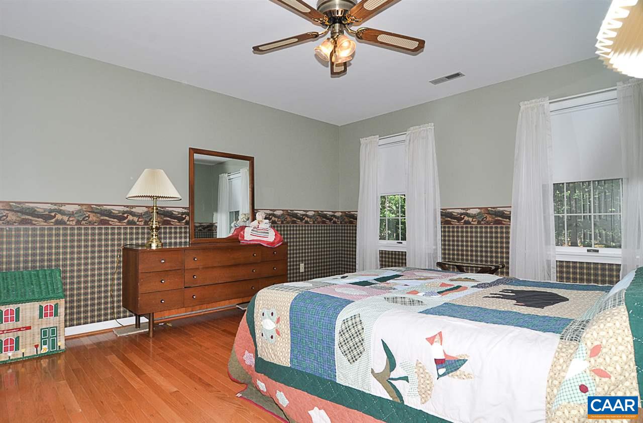 2424 Thrush Road Charlottesville, VA 22901 - Photo 23 of 25 a bedroom with a bed and a dresser