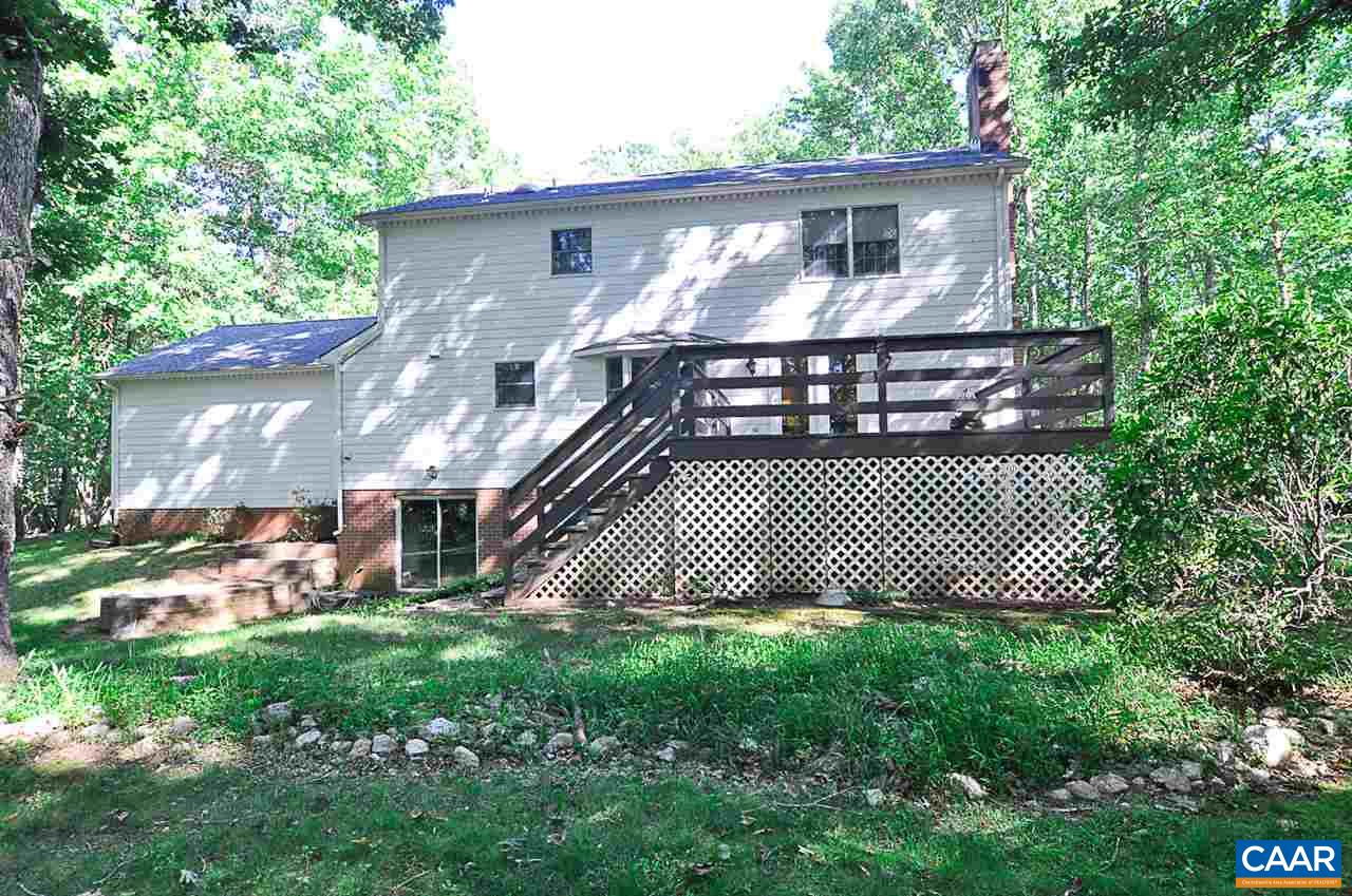 2424 Thrush Road Charlottesville, VA 22901 - Photo 4 of 25 a front view of a house with a garden