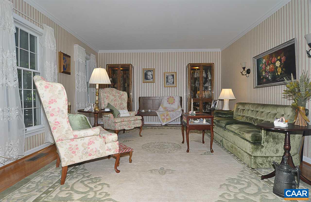 2424 Thrush Road Charlottesville, VA 22901 - Photo 7 of 25 a living room with furniture and wooden floor