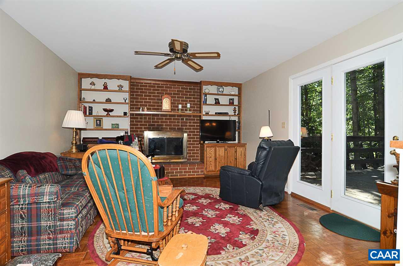 2424 Thrush Road Charlottesville, VA 22901 - Photo 10 of 25 a living room with furniture fireplace and window