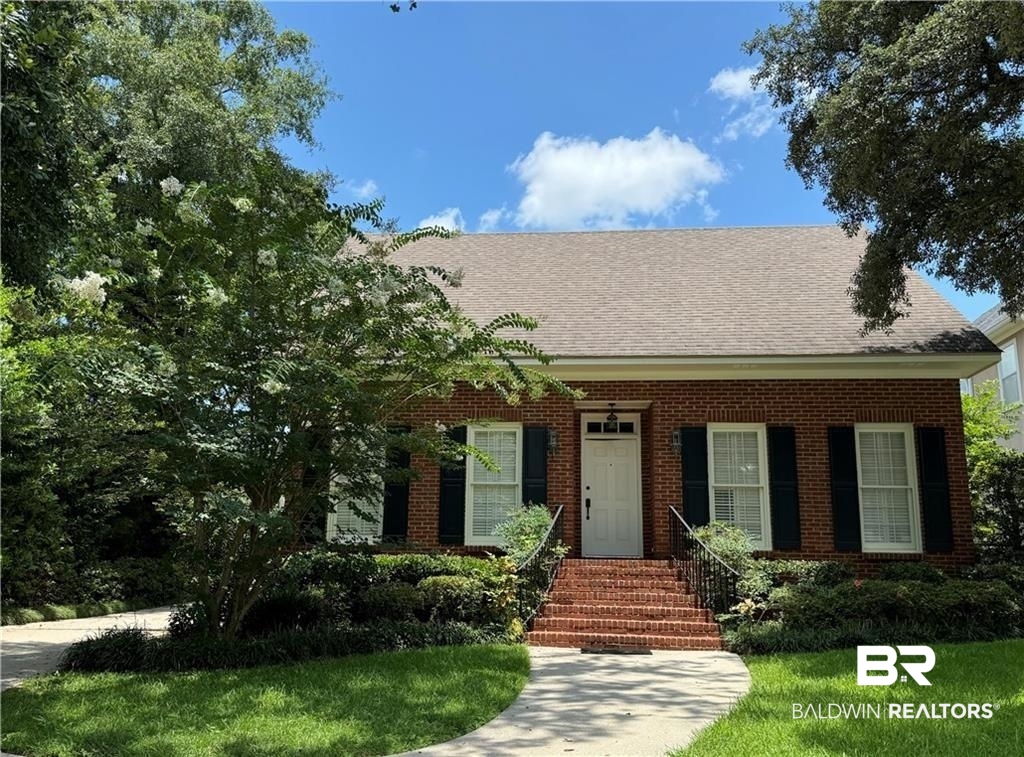 3932 Mcgregor Court Mobile, AL 36608 - Photo 1 of 9 View of front facade featuring a front lawn