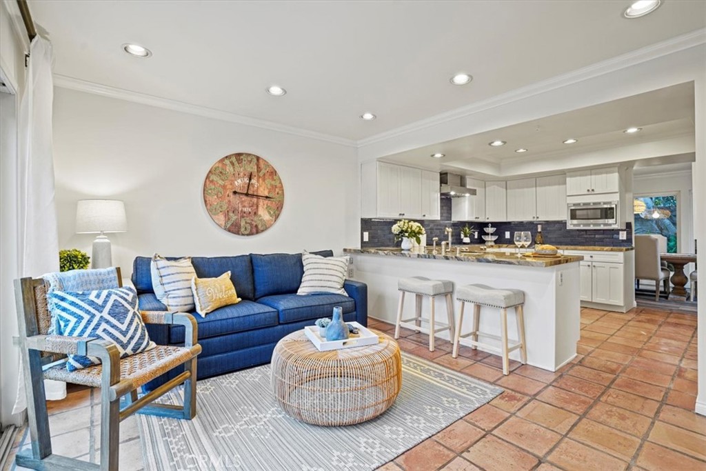 23802 Cassandra Bay Dana Point, CA 92629 - Photo 13 of 56 a living room with furniture and kitchen view