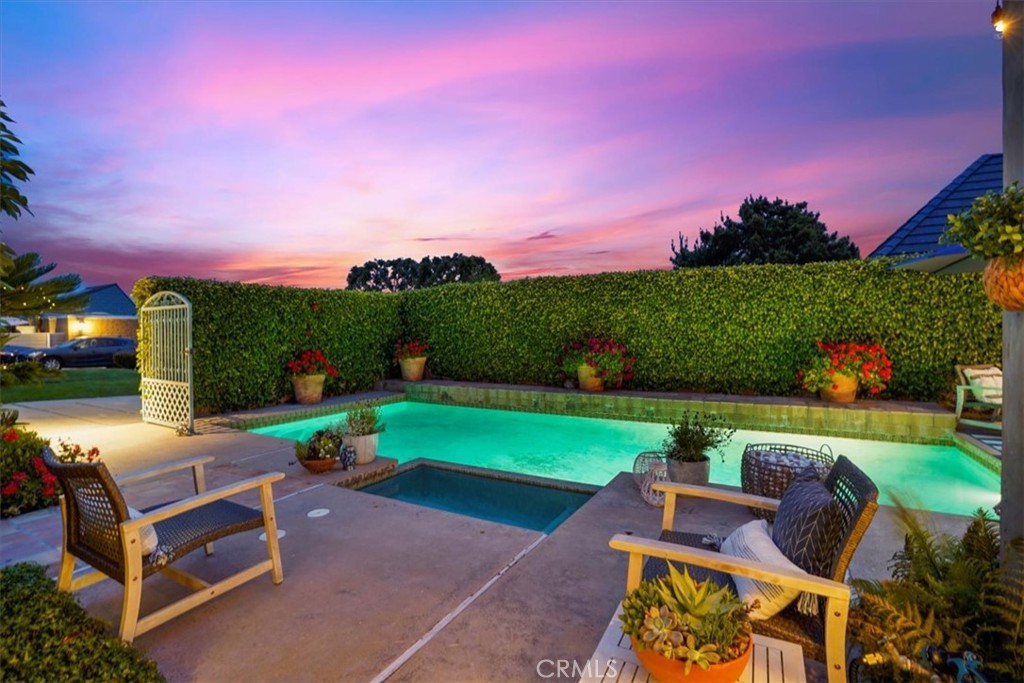 23802 Cassandra Bay Dana Point, CA 92629 - Photo 3 of 56 a view of a with table and chairs with plants and trees