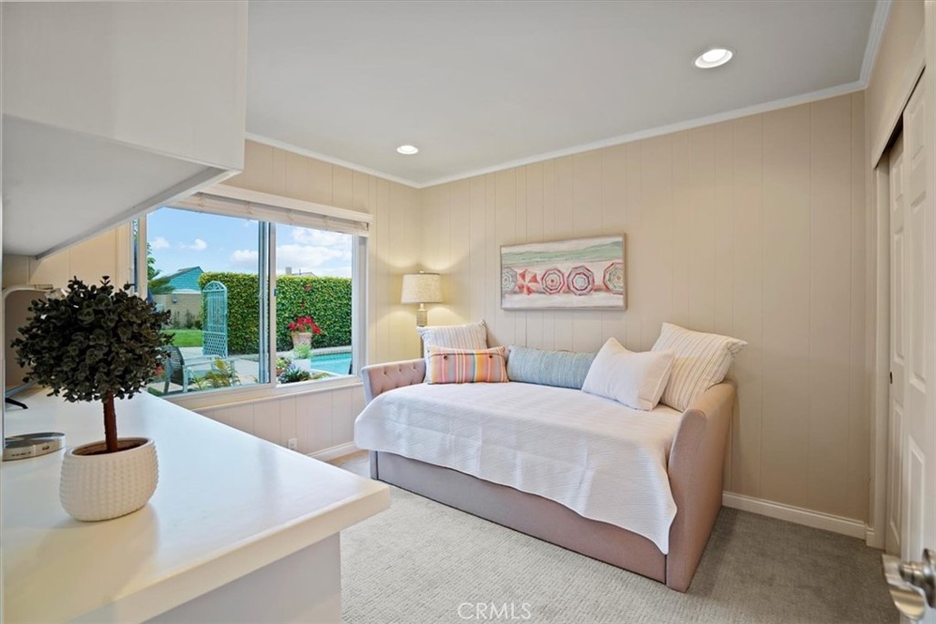 23802 Cassandra Bay Dana Point, CA 92629 - Photo 42 of 56 a bedroom with a bed and a large window