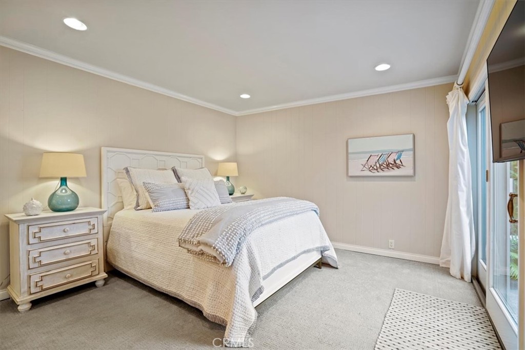 23802 Cassandra Bay Dana Point, CA 92629 - Photo 45 of 56 a bedroom with a bed and a cabinets