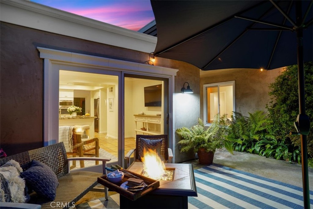 23802 Cassandra Bay Dana Point, CA 92629 - Photo 5 of 56 a living room with furniture and a potted plant