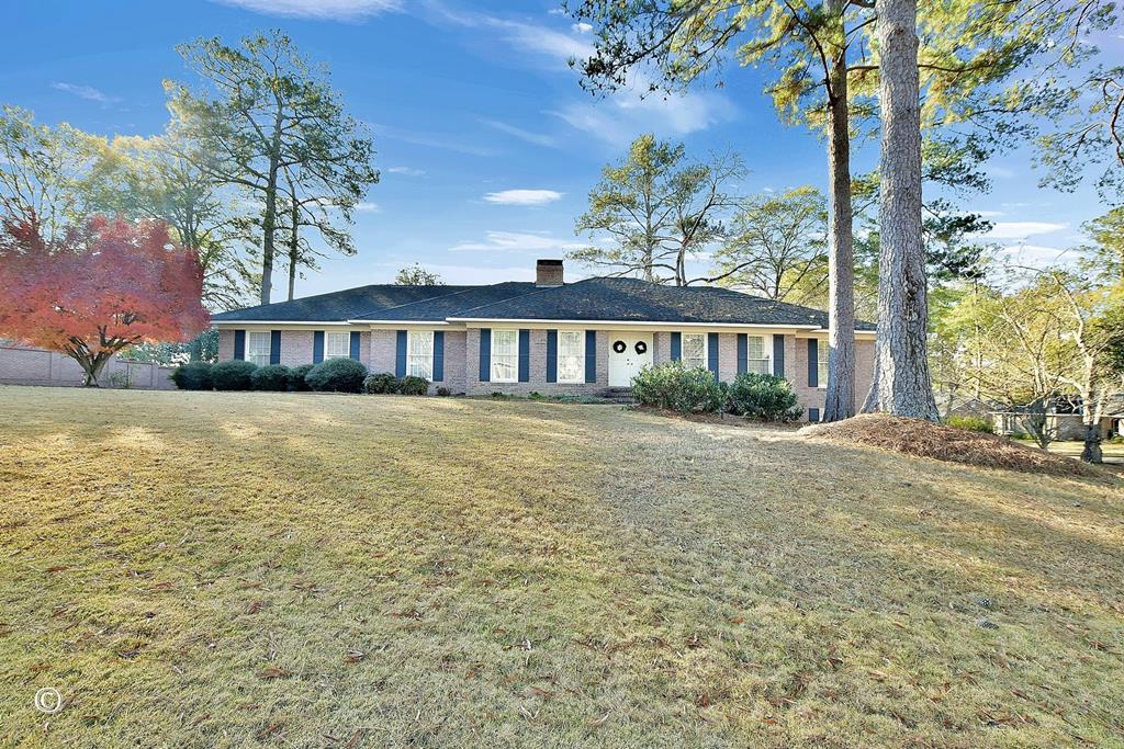 a view of a house with a ocean view