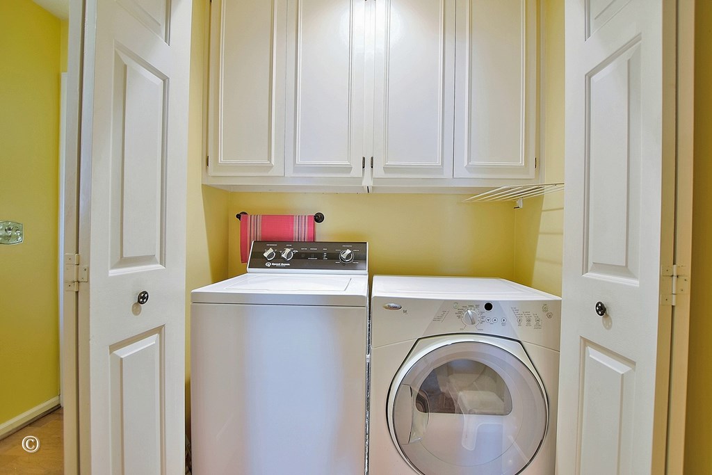 5002 Sears Court Columbus, GA 31907 - Photo 12 of 35 a utility room with dryer and washer