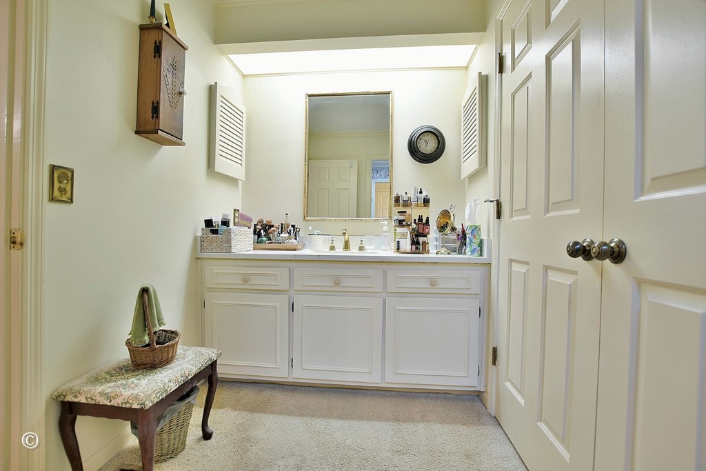 5002 Sears Court Columbus, GA 31907 - Photo 23 of 35 a bathroom with a sink and a mirror