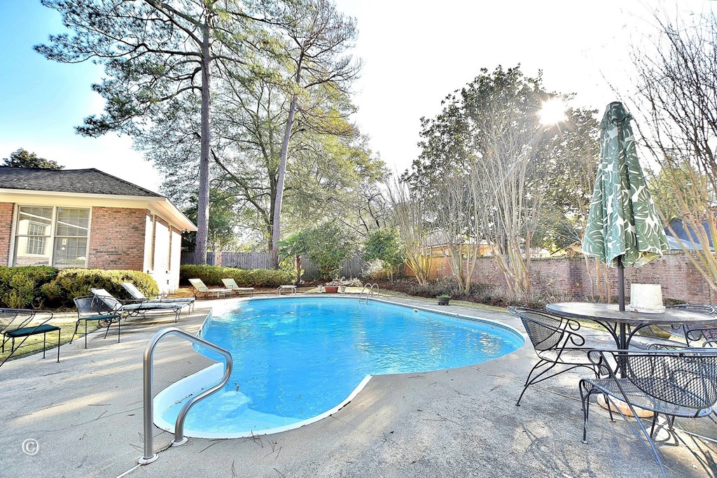 5002 Sears Court Columbus, GA 31907 - Photo 33 of 35 a view of a house with backyard and sitting area